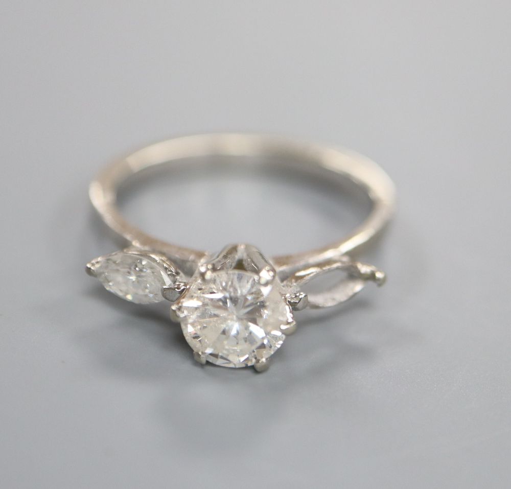 A modern 18ct gold and two (ex three) stone diamond ring